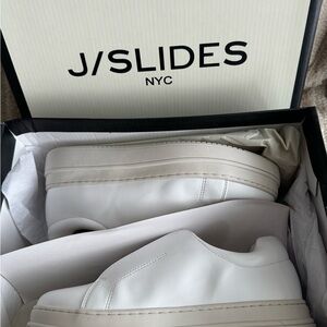 New in box. J/slides platform slip on sneakers. Size 6